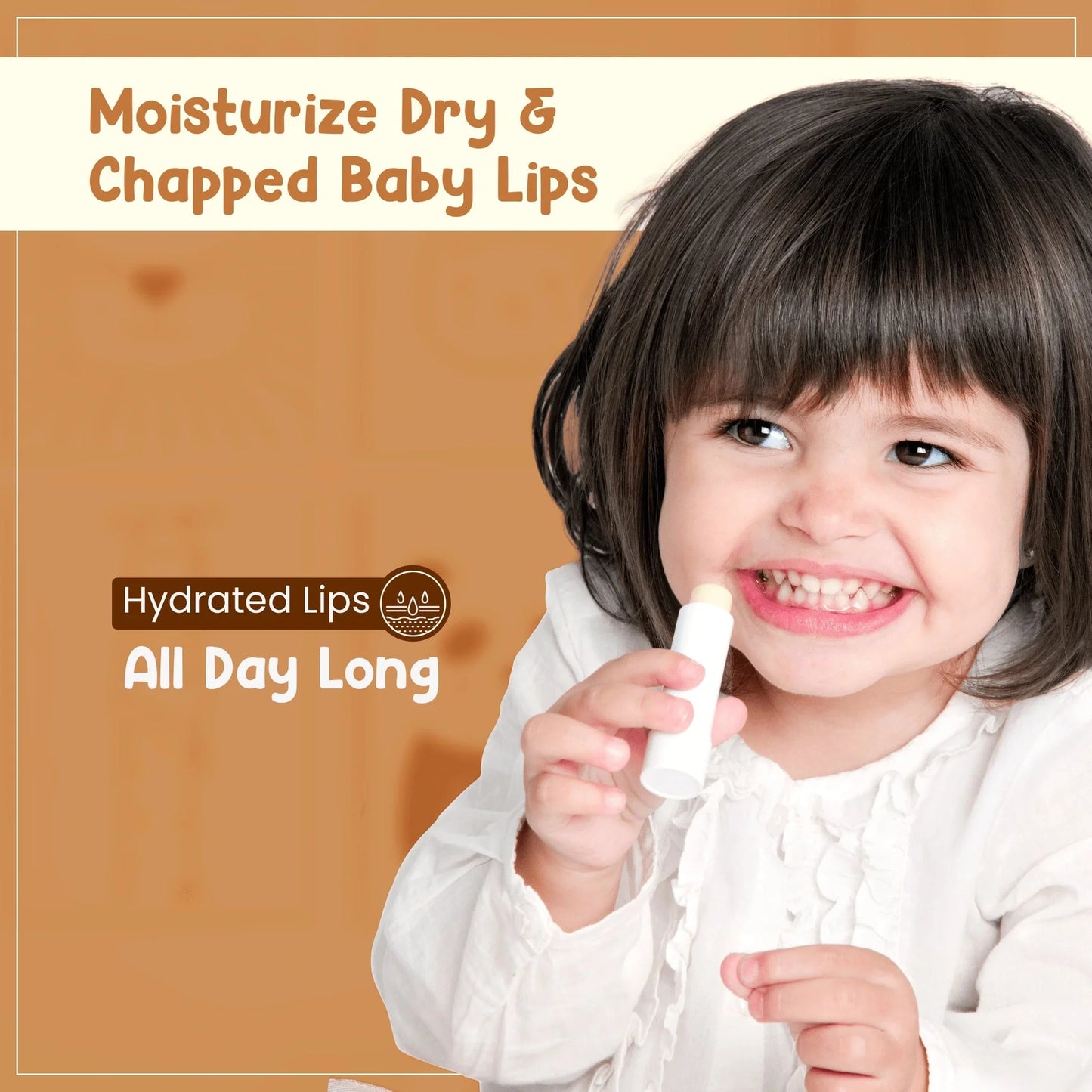 Smiling toddler applying a white stick of baby lip balm to moisturize dry and chapped lips