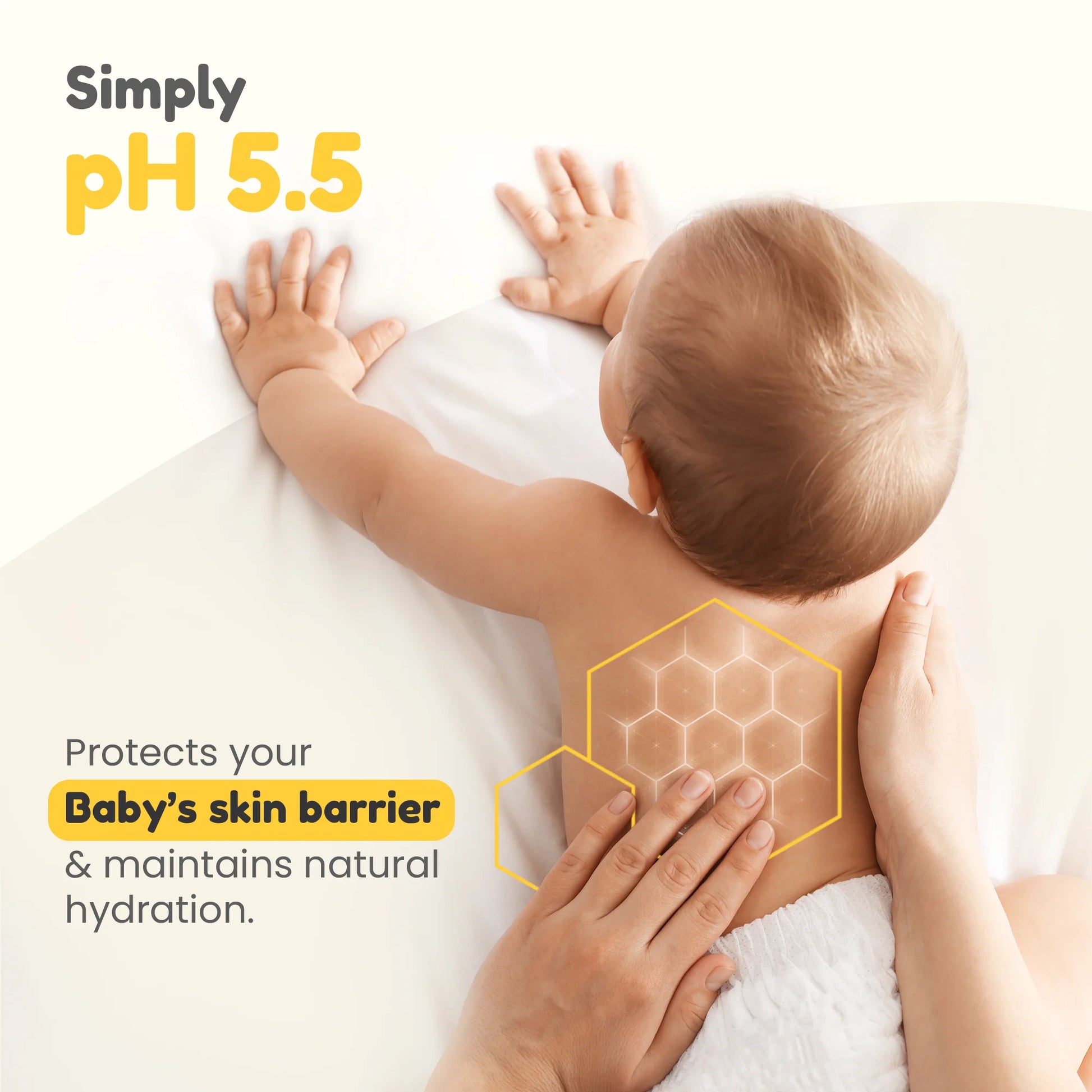 Mother applying lotion to baby's back, emphasizing pH 5.5 formula protects baby's skin barrier and maintains natural hydration.