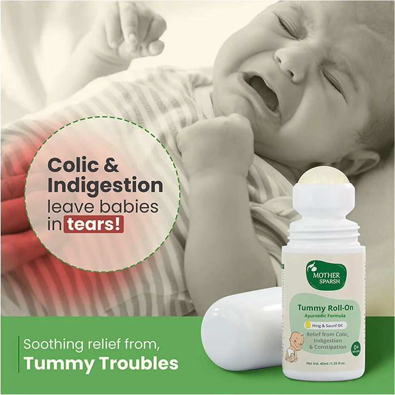 Crying baby receiving soothing relief from colic and indigestion with a natural tummy roll on.