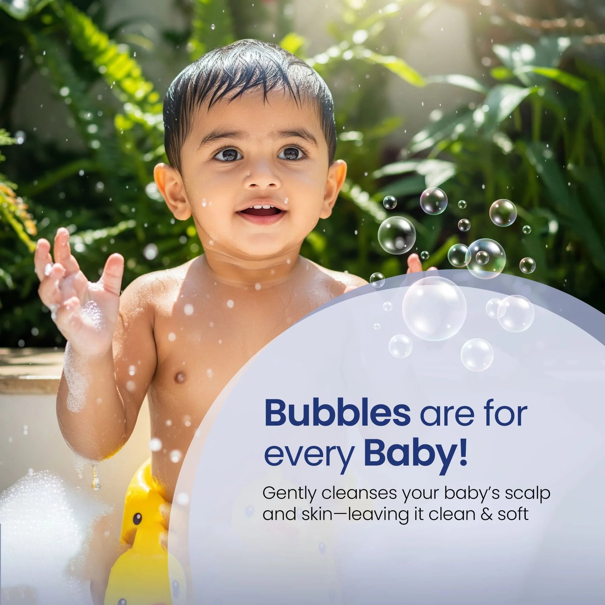 Happy baby enjoying bath time with soft bubbles using natural baby shampoo